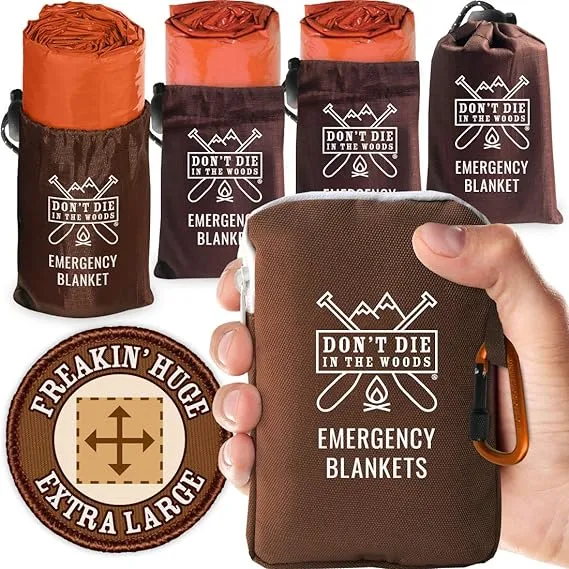 Don't Die In The Woods - Freakin’ Huge Emergency Blankets [4-Pack] Extra-Large Thermal Mylar Space Blankets with Ripstop Nylon Stuff Sacks + Carabiner Zipper Pack [Survival Orange]