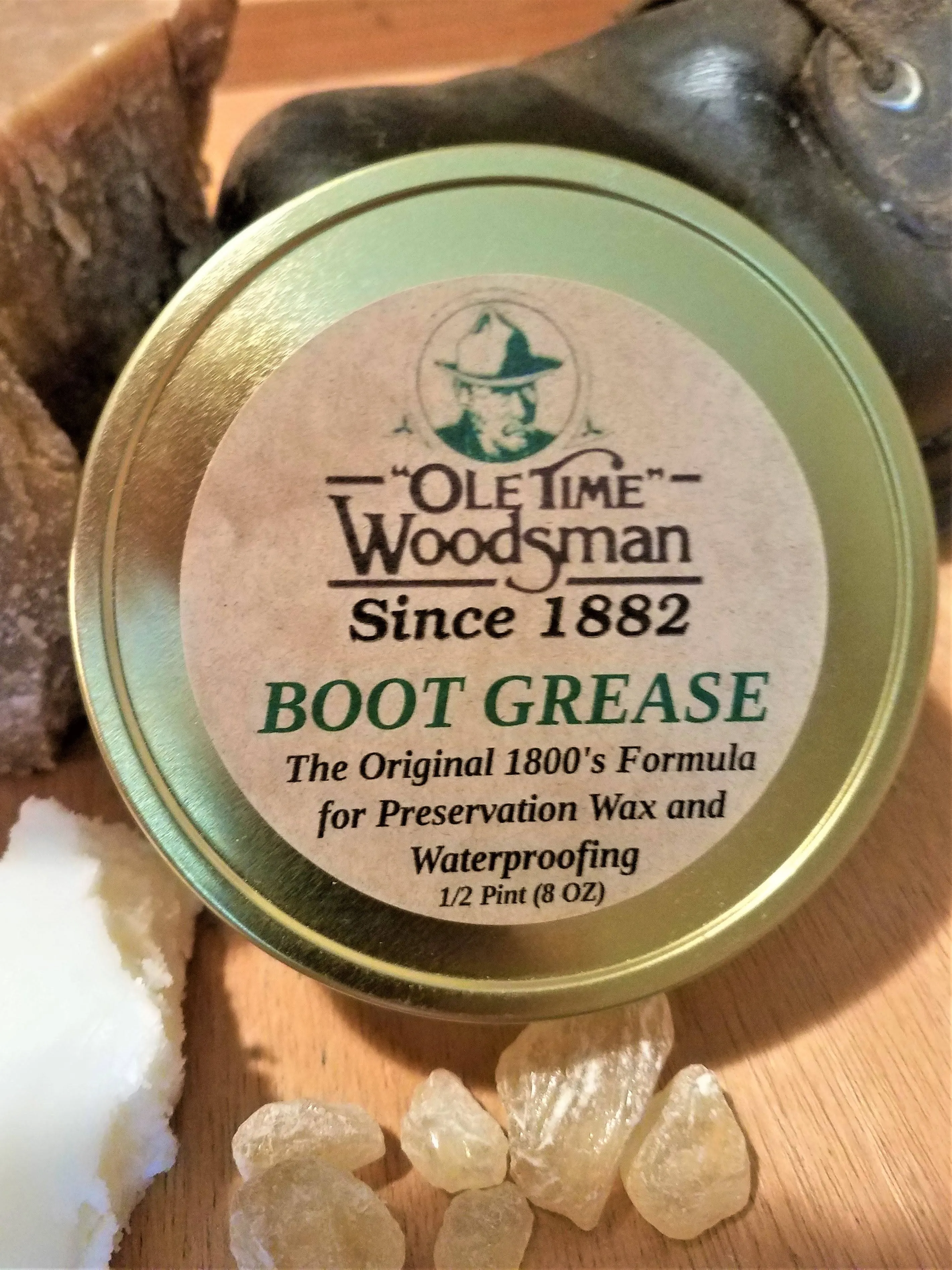 "Ole Time Woodsman Boot Grease. The Original 1800's Formula for Preservation Wax and Waterproofing."